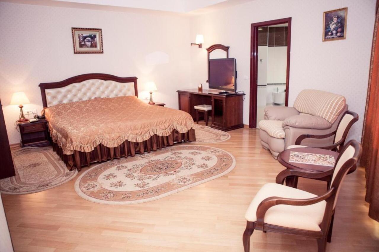 Grand Hotel Victory Актау Экстерьер фото A bedroom