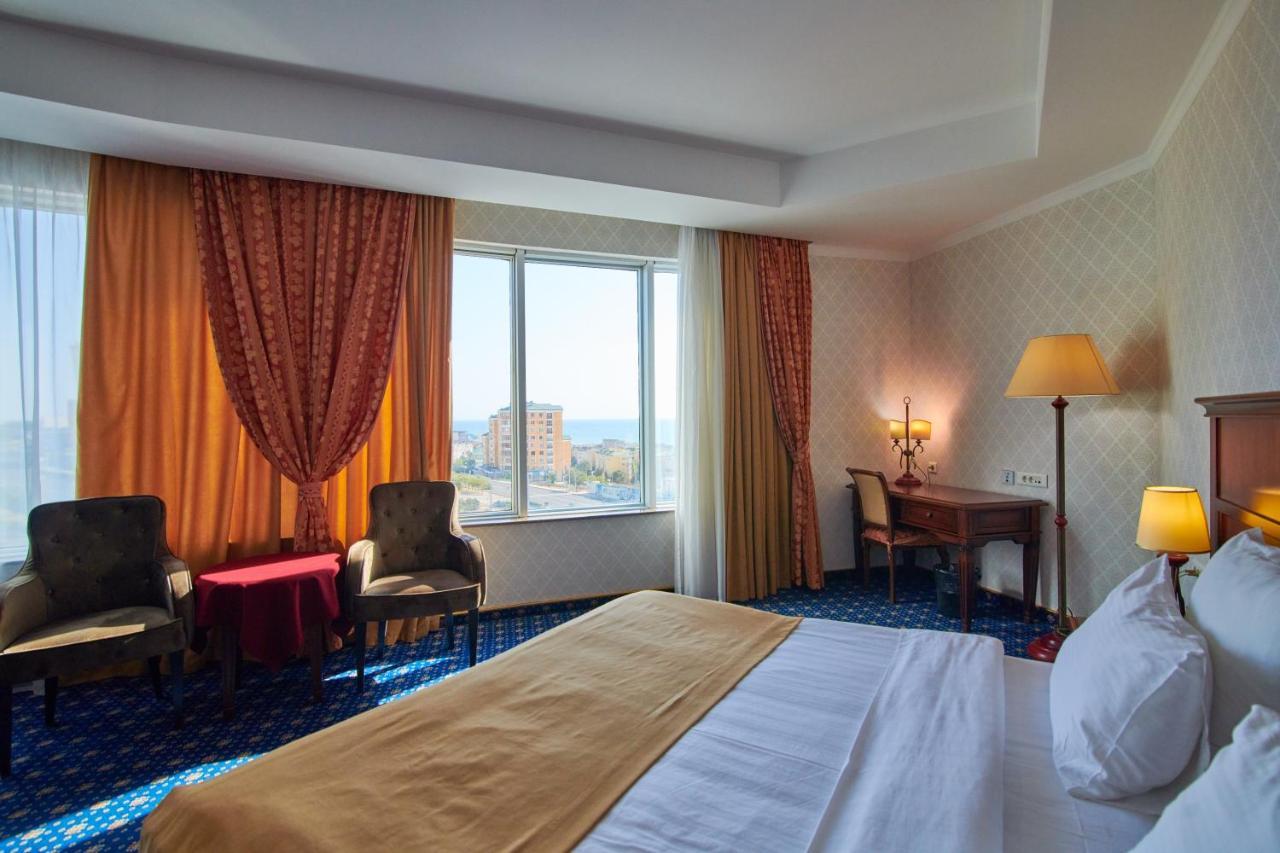 Grand Hotel Victory Актау Экстерьер фото A room at the Radisson Blu Hotel, Baku
