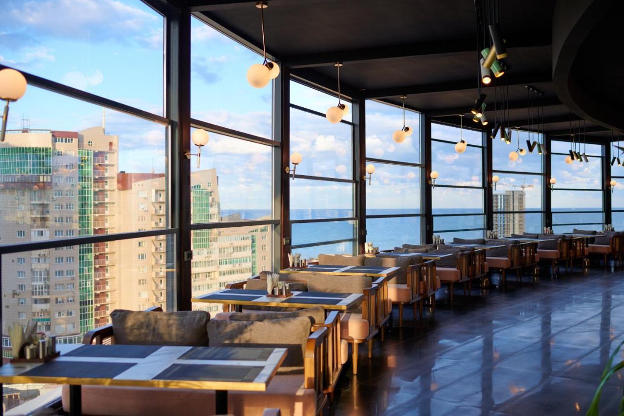 Grand Hotel Victory Актау Экстерьер фото Skyline Bar
