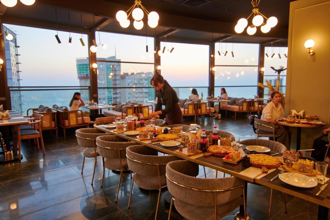 Grand Hotel Victory Актау Экстерьер фото The restaurant