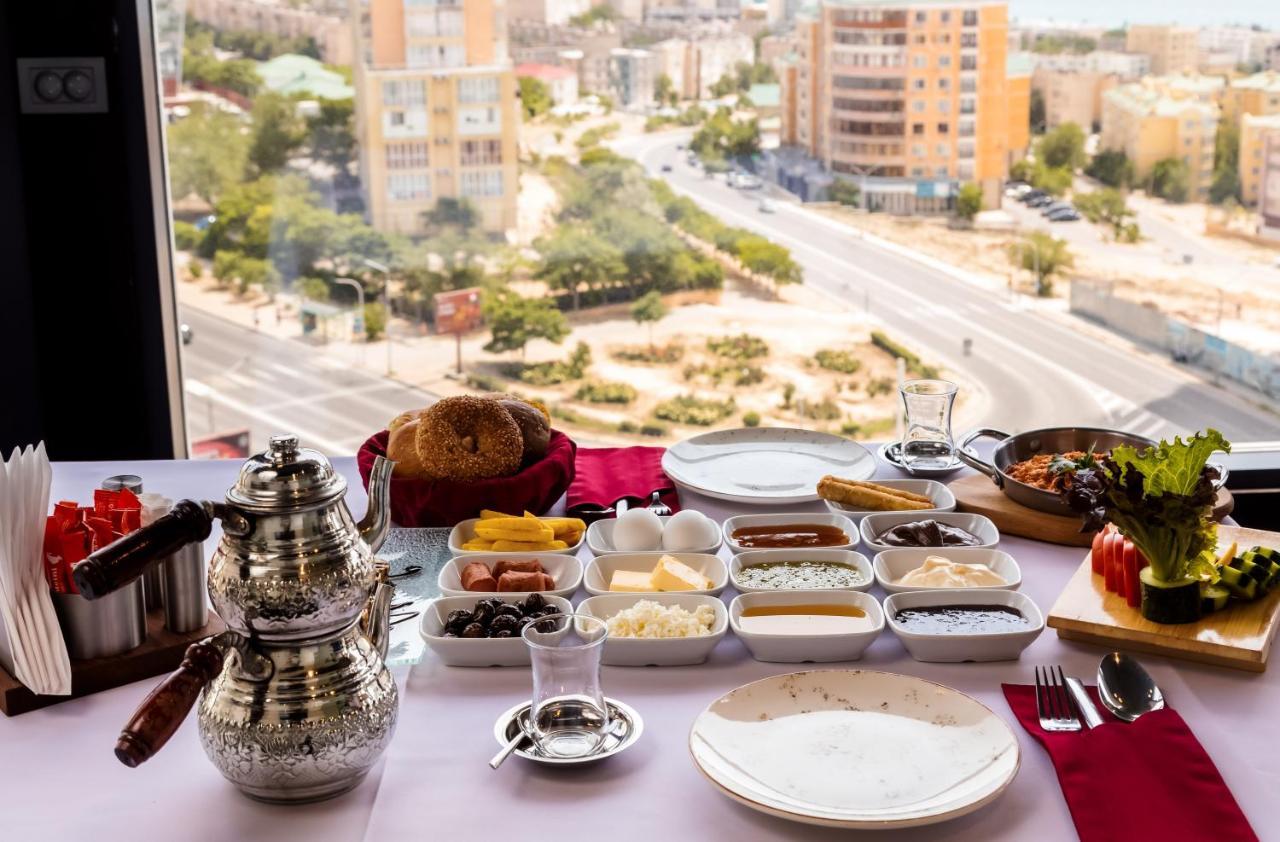 Grand Hotel Victory Актау Экстерьер фото Israeli breakfast