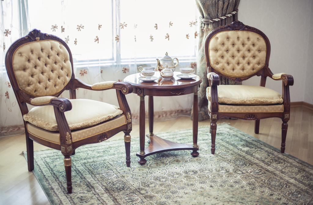 Grand Hotel Victory Актау Экстерьер фото A carpet in a living room